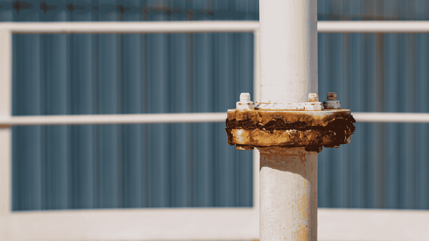 Galvanic corrosion occurring between dissimilar metals where two dissimilar metals such as stainless steel and galvanized steel are in electrical contact, affecting zinc coating and other metals like copper pipes, explained by the galvanic series, showing galvanic corrosion risks when two metals are exposed to the presence of an electrolyte in harsh environments and why to apply protective coatings