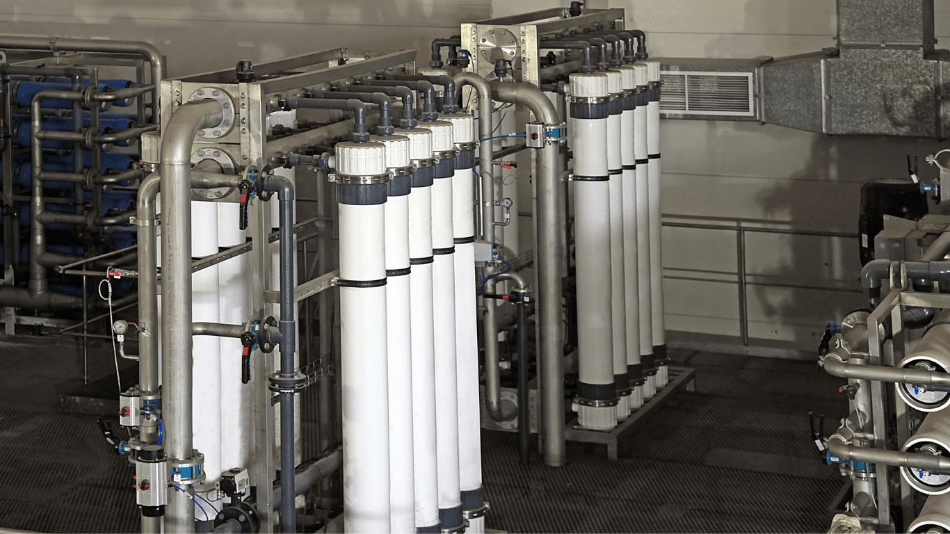 Reverse osmosis system cost breakdown for a whole house reverse osmosis system installation. The image shows a commercial reverse osmosis system with multiple filtration stages, including reverse osmosis filtration membranes and carbon filters. This whole house RO system is designed to treat municipal water and improve tap water quality through a multi-stage filtration process, including the removal of contaminants and impurities. Reverse osmosis systems for entire homes, such as house reverse osmosis systems, provide drinking water through a high-efficiency filtration method. The filtration process involves several stages, such as reverse osmosis, carbon filters, and water softeners, and typically includes a storage tank for holding filtered water. The system requires proper installation, including a drain line and water supply connections, and the installation costs depend on the size and complexity of the system, whether for a whole home or a smaller point-of-use (POU) system. Water treatment companies offer various reverse osmosis systems to meet different needs, from whole house RO systems to other water filtration systems. These systems are designed to save space while ensuring optimal water pressure and minimizing water waste. A well-maintained reverse osmosis water system can significantly improve the quality of drinking water throughout the entire home, offering a sustainable solution for homeowners looking to improve their water filtration.