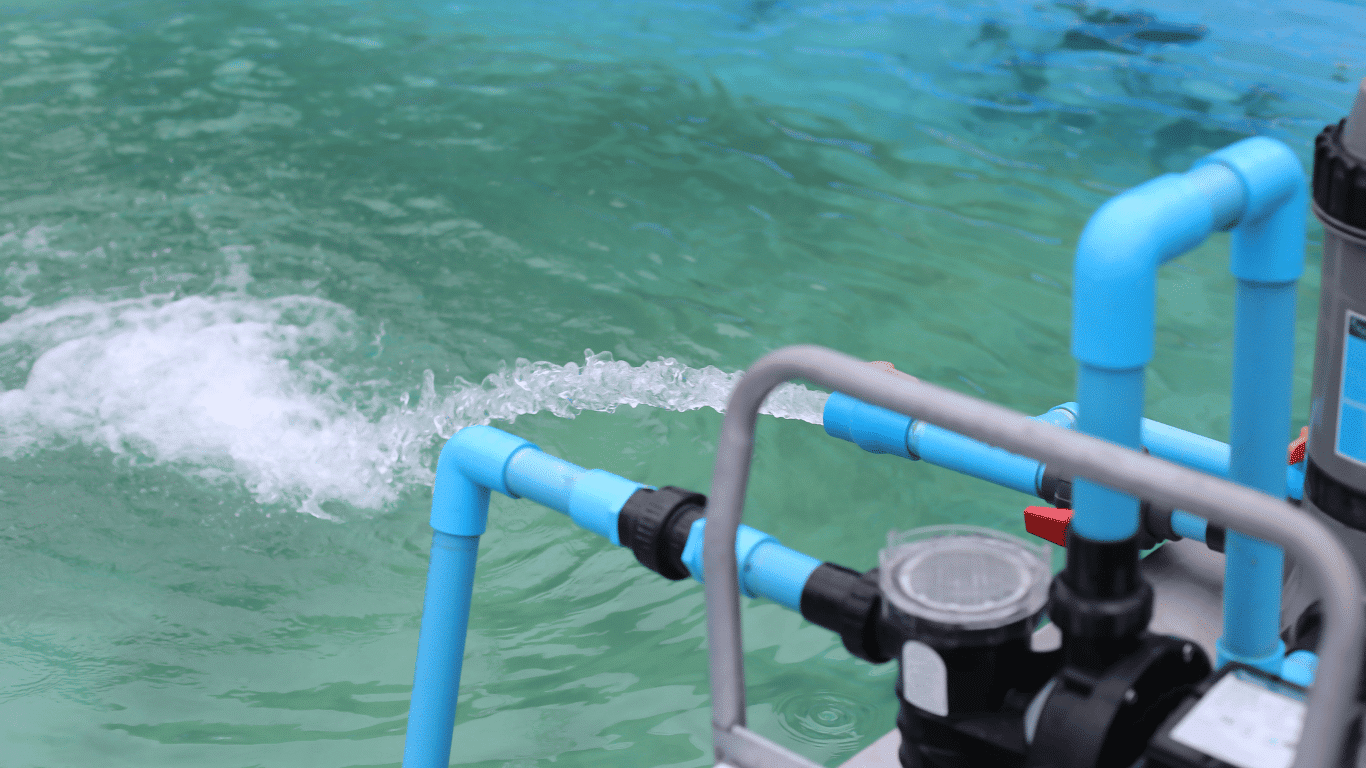 Chlorine injection system with injection pump, metering pump, tubing, and injection point delivering liquid chlorine into flowing water for water treatment, chlorination, bacteria control, oxidation, and improved water quality in commercial water systems.