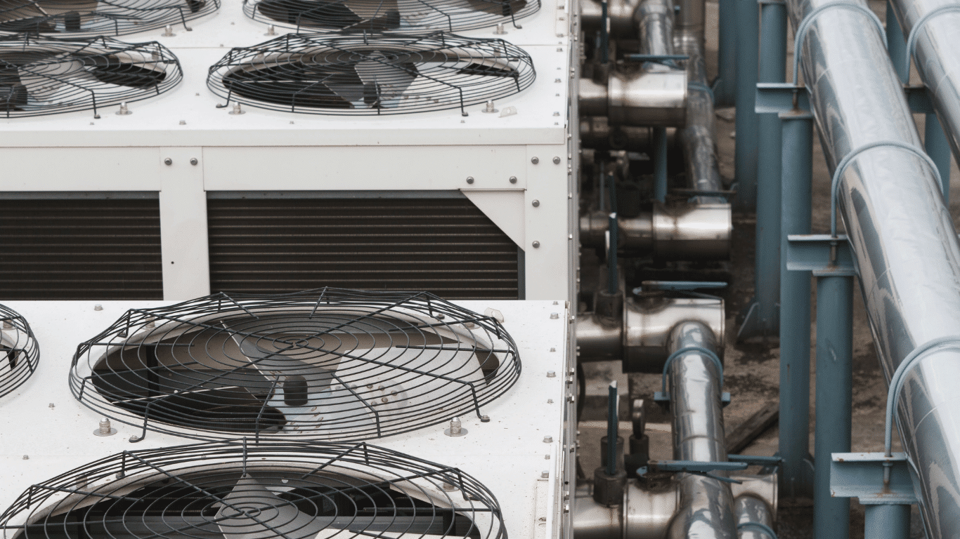Cooling towers with installed tower drift eliminators reducing mist, evaporation, and drift loss in evaporative condensers