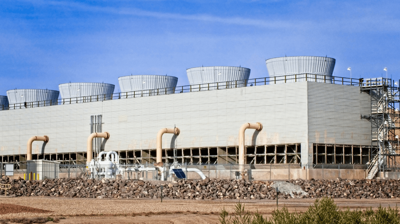 Industrial cooling tower with large fans and airflow components designed to improve cooling tower efficiency, regulate water temperature, and support reliable heat transfer performance.