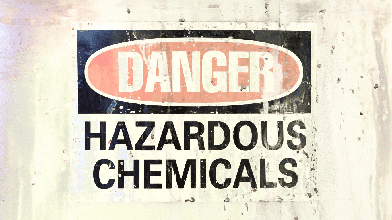 Hazardous chemicals warning sign highlighting chemical hazards, workplace hazards, and safe storage requirements.