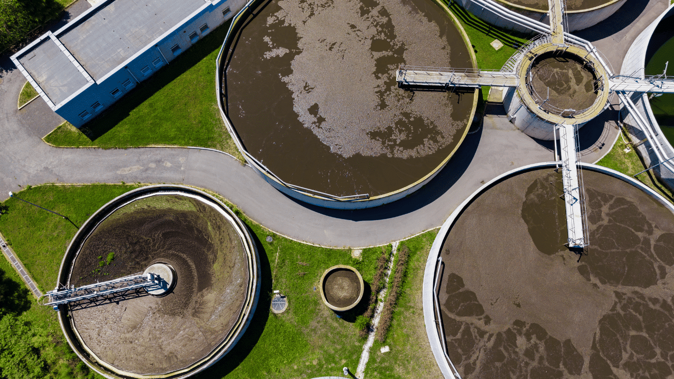 Aerial view of an industrial wastewater treatment plant with large treatment systems for water treatment, wastewater management, water purification, and clean water production.
