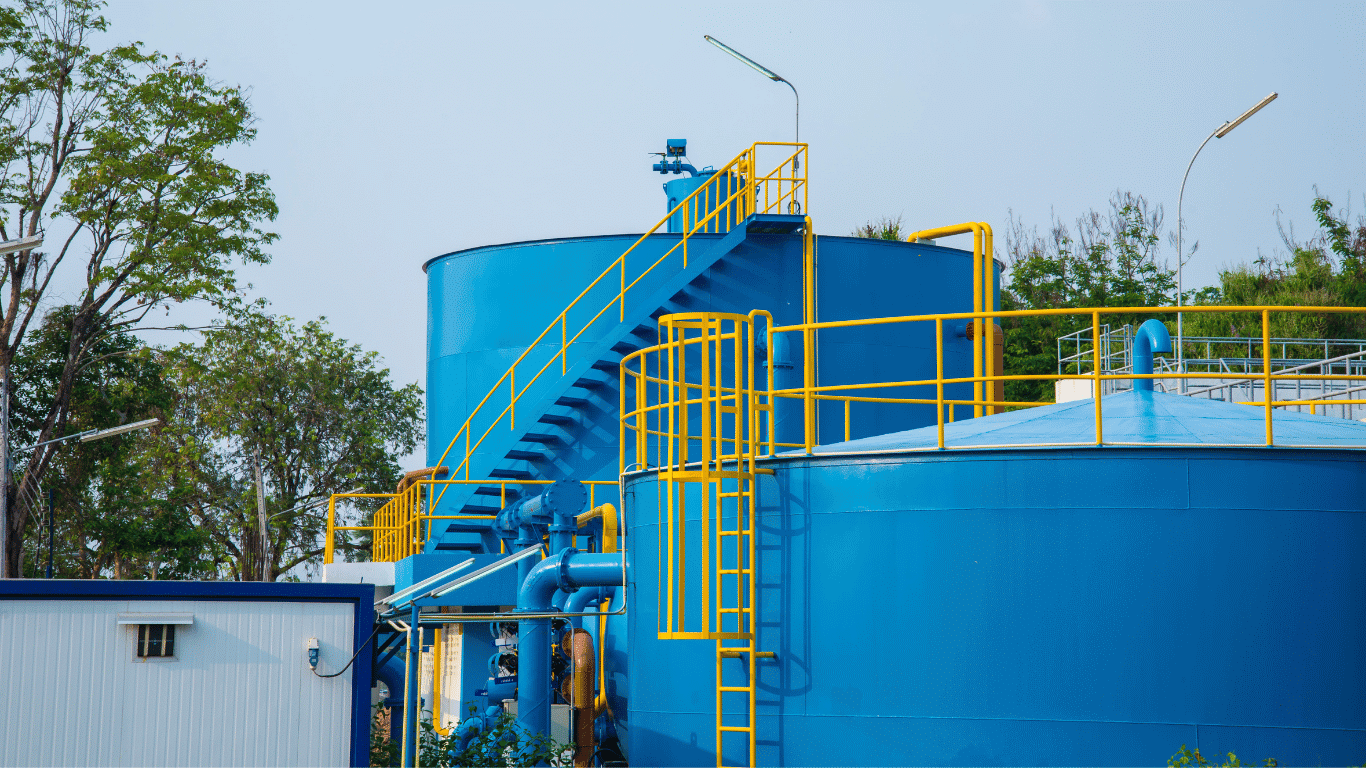 Industrial water treatment tanks and piping used in water treatment programs to control microbial growth in cooling towers and industrial water systems.