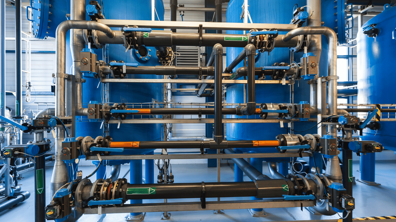 Industrial zero liquid discharge system with pipes and treatment equipment for wastewater treatment, liquid discharge treatment, water reuse, and waste reduction.